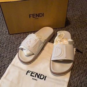 Men’s Fendi slides.